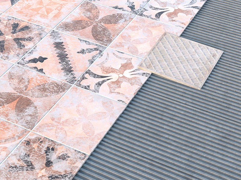 Fliesen werden sorgfältig in frischen Fliesenkleber auf Bodenplatte gelegt, präzise Handwerksarbeit im Innenraum